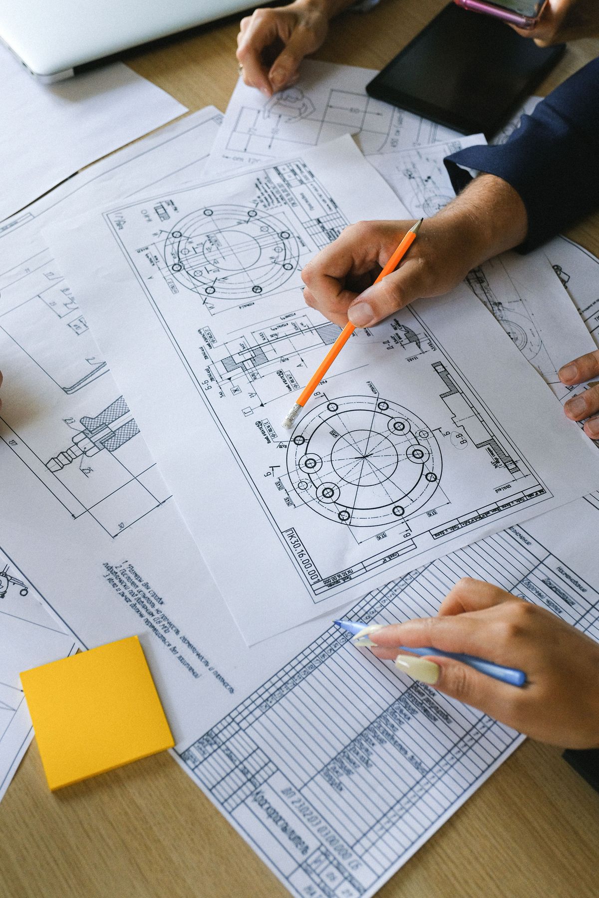 Structural steel fabrication drawing with dimensioned views and bill of materials